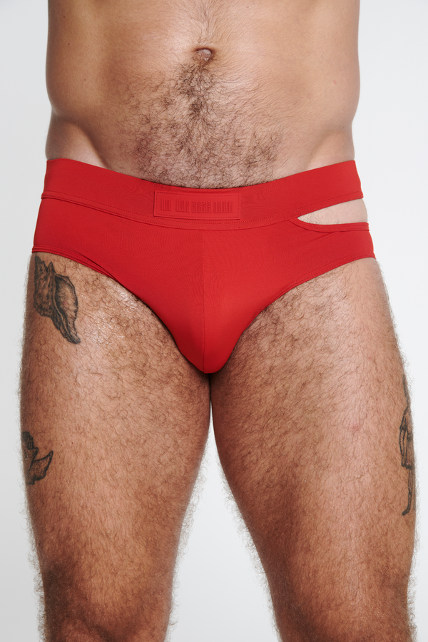 SWIM BRIEF WITH ASYMMETRICAL OPENING IN RECYCLED JERSEY